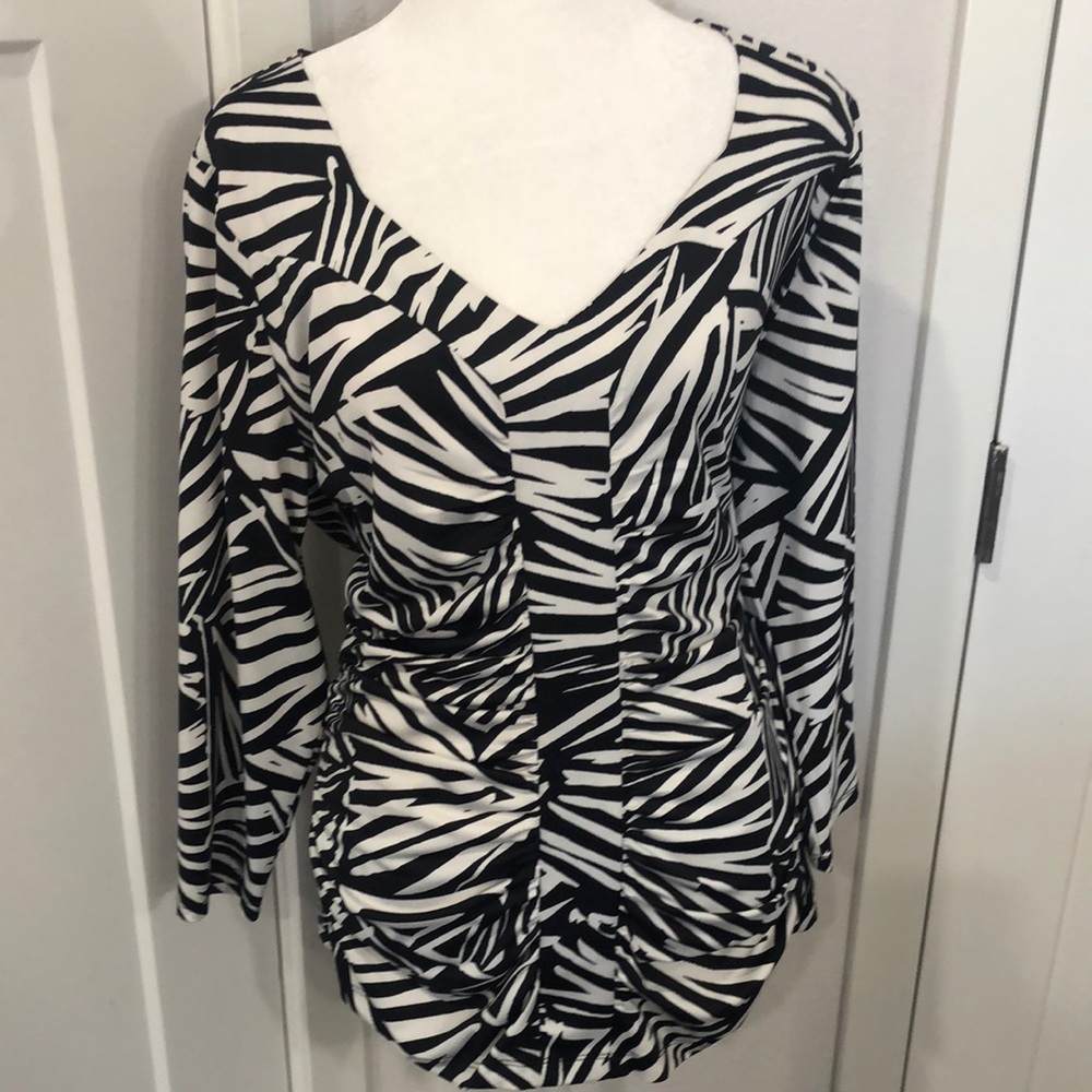 Sofía Vergara women’s Black and White Zebra Print Top. Business career office